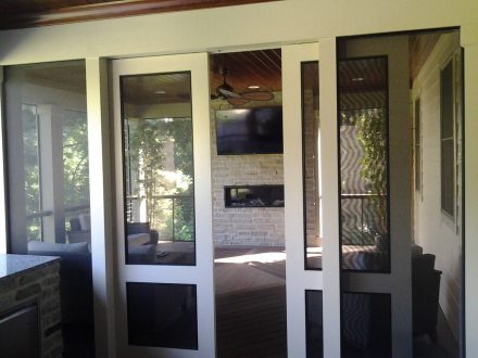 Full Outdoor Kitchen with Sliding Doors to Screened-In-Porch