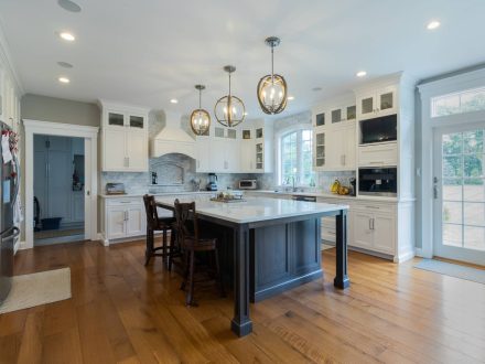 New kitchen remodel with sphere chandeliers and large island