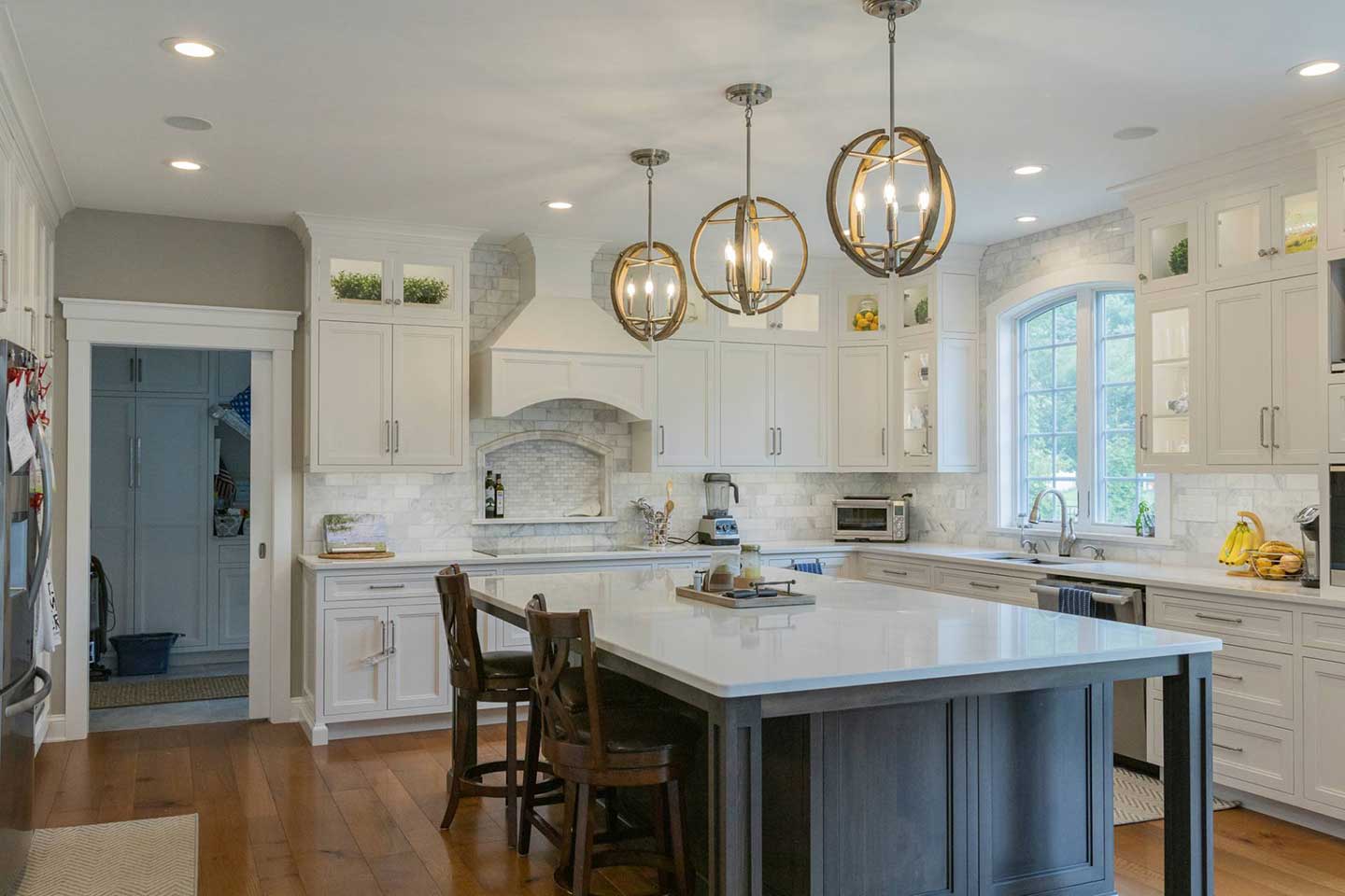A local kitchen renovation featuring a large kitchen island performed by Lancaster contractors.